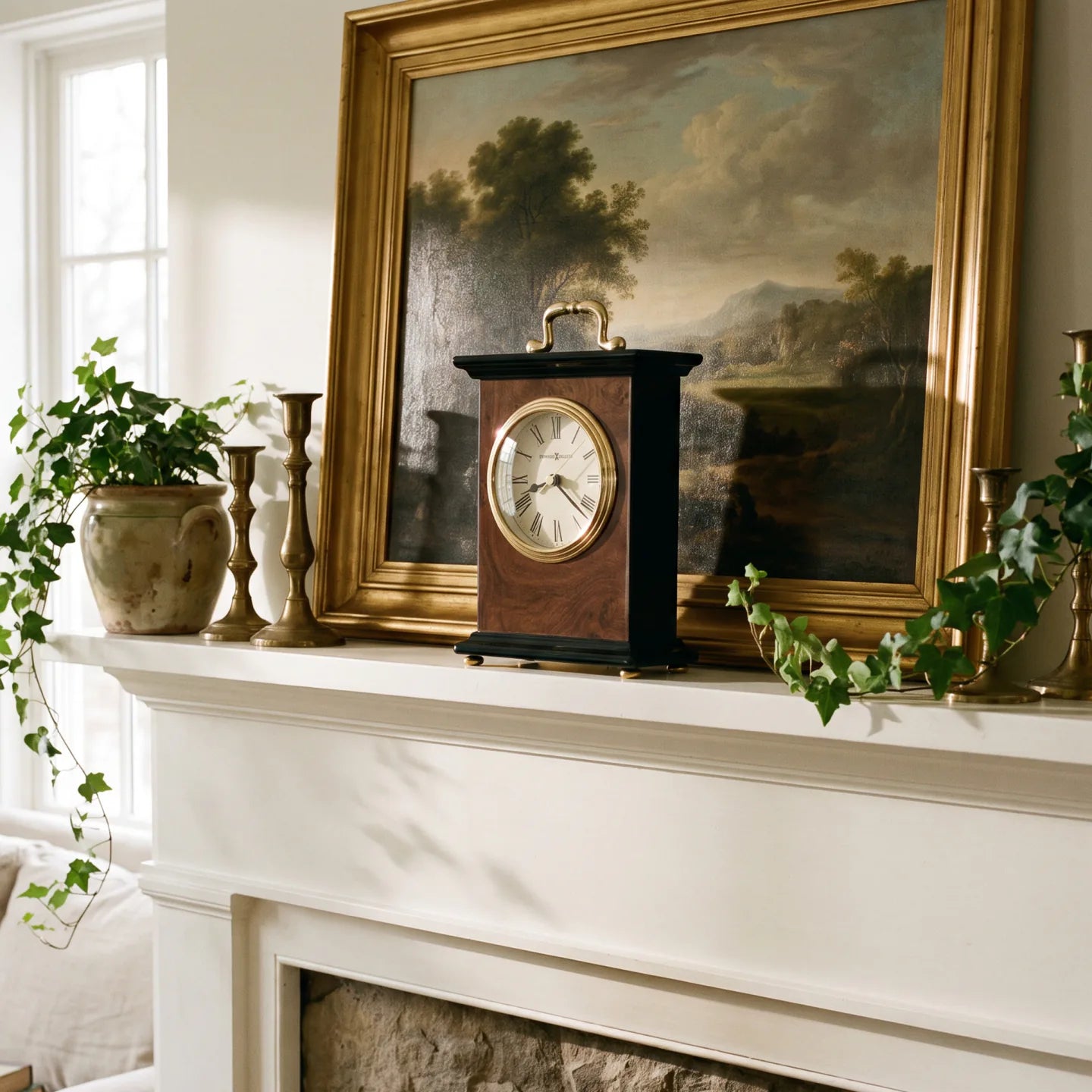Howard Miller Berkley Tabletop Clock, 8-inch, on a shelf in a styled room