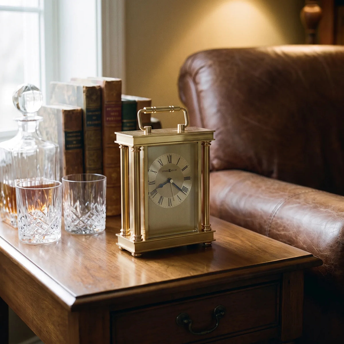 Howard Miller Audra Tabletop Clock, 8-inch, on a shelf in a styled room
