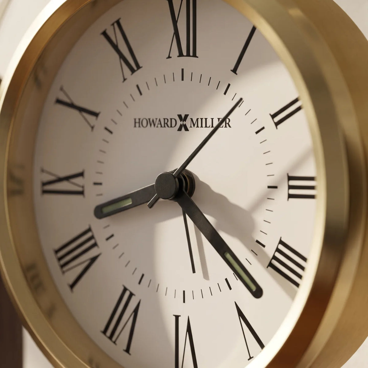 Howard Miller Derrick Tabletop Clock, close-up of the dial and finish detail
