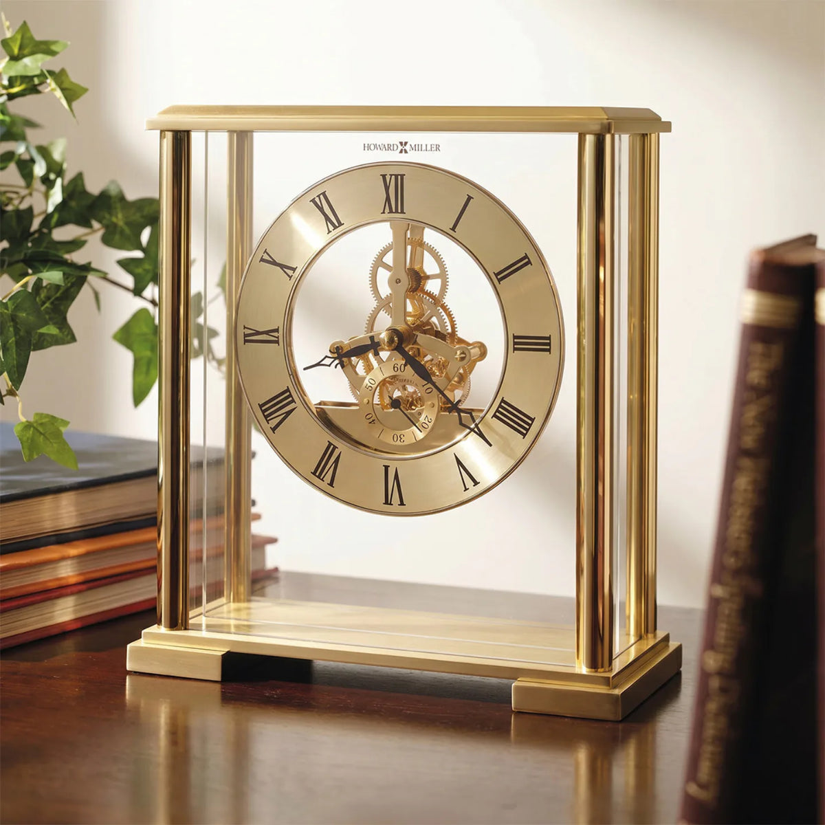 Howard Miller Fairview Tabletop Clock, 8-inch, on a shelf in a styled room