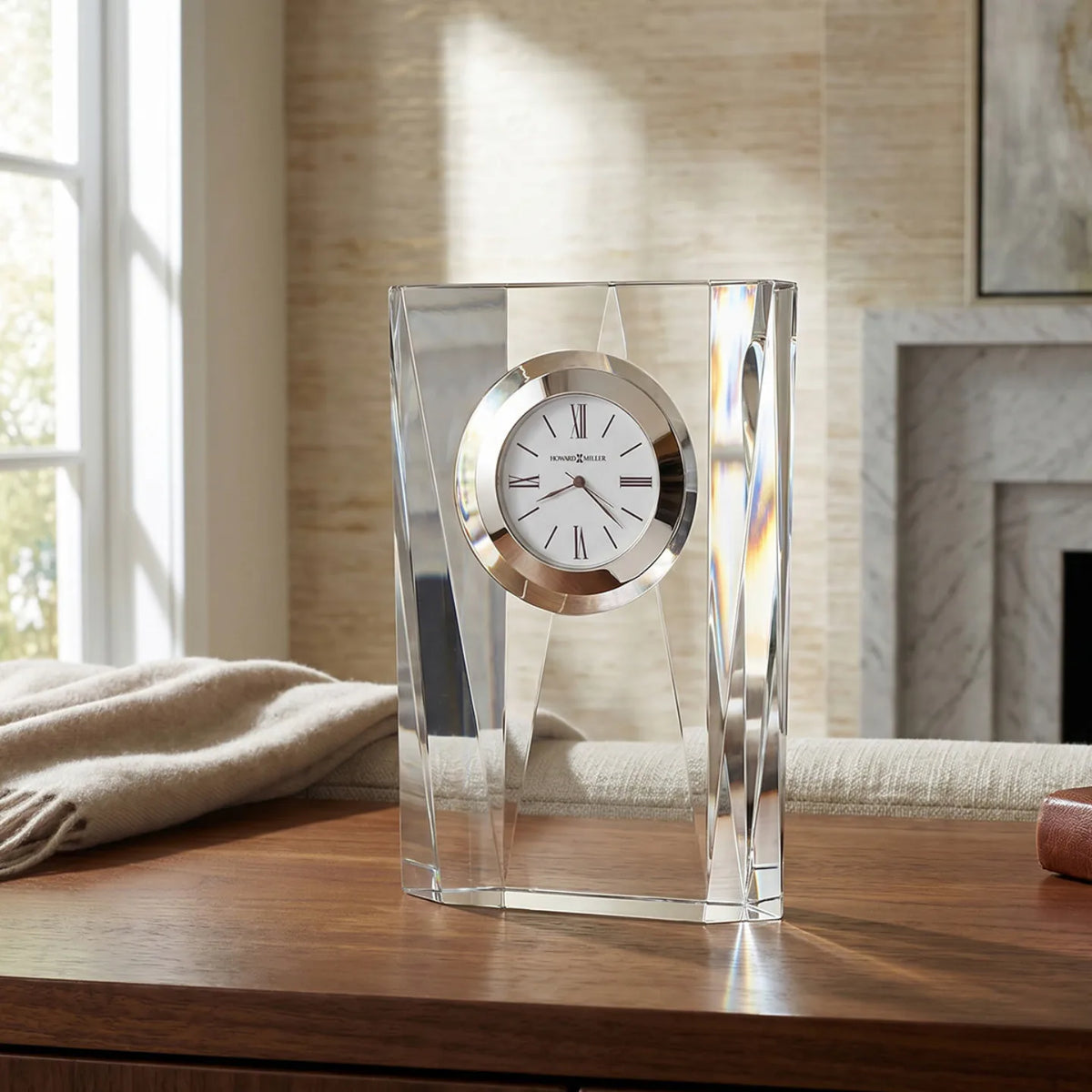Howard Miller Quest Tabletop Clock, 7-inch, on a shelf in a styled room