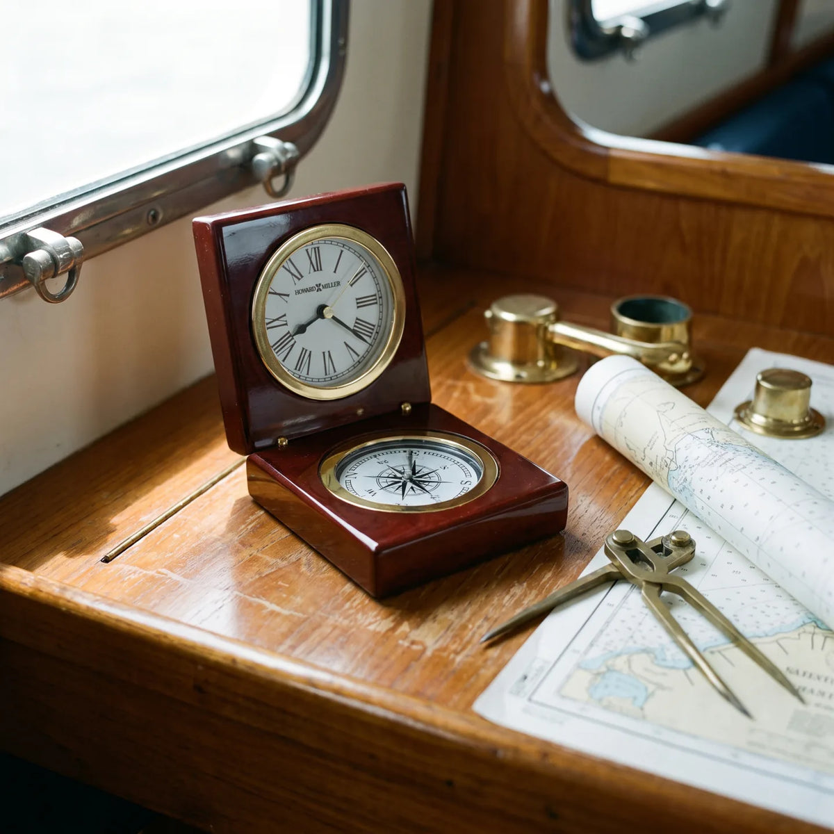 Howard Miller Pursuit Tabletop Clock, 4-inch, on a shelf in a styled room