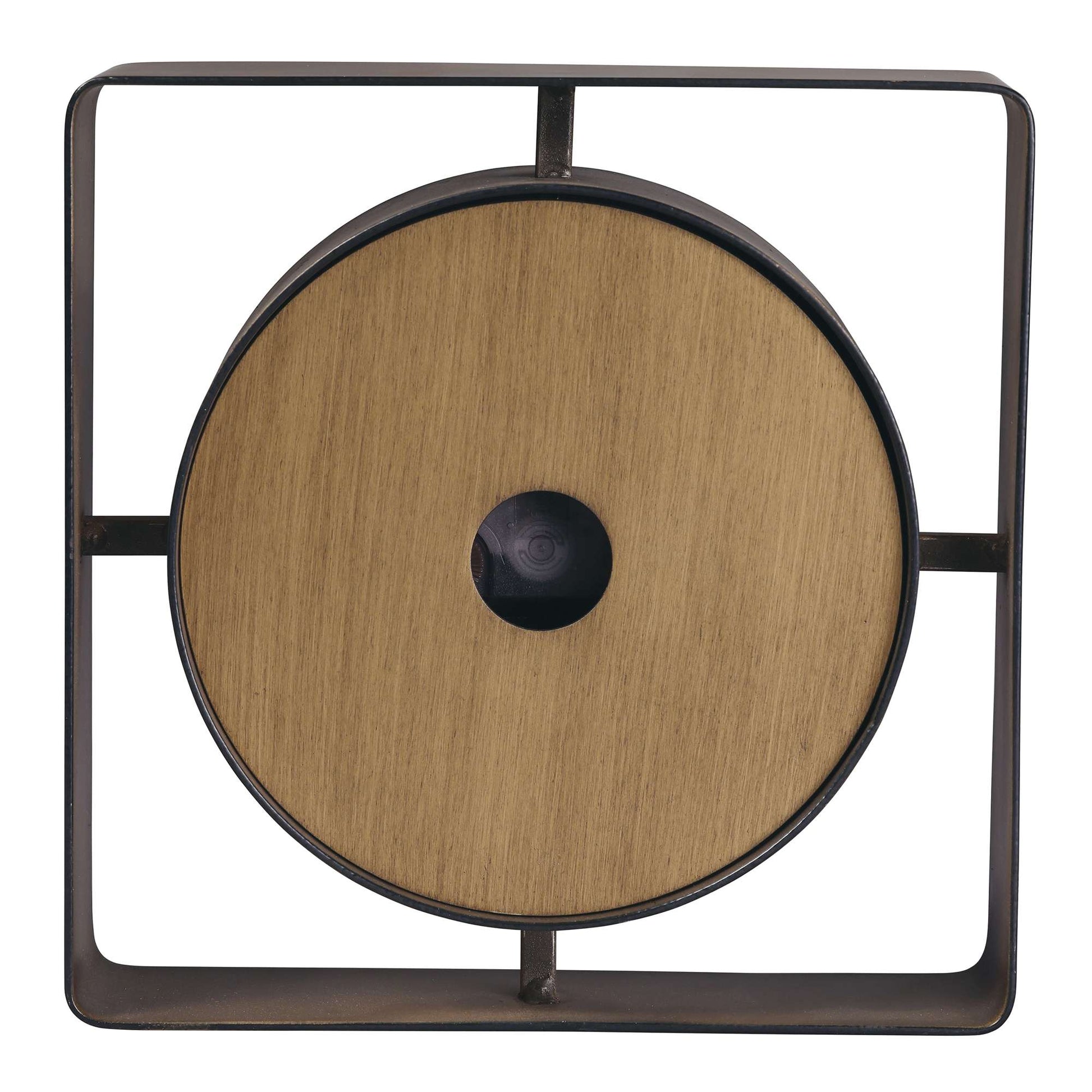 Circular wooden wall decor with a black center in a square metal frame.