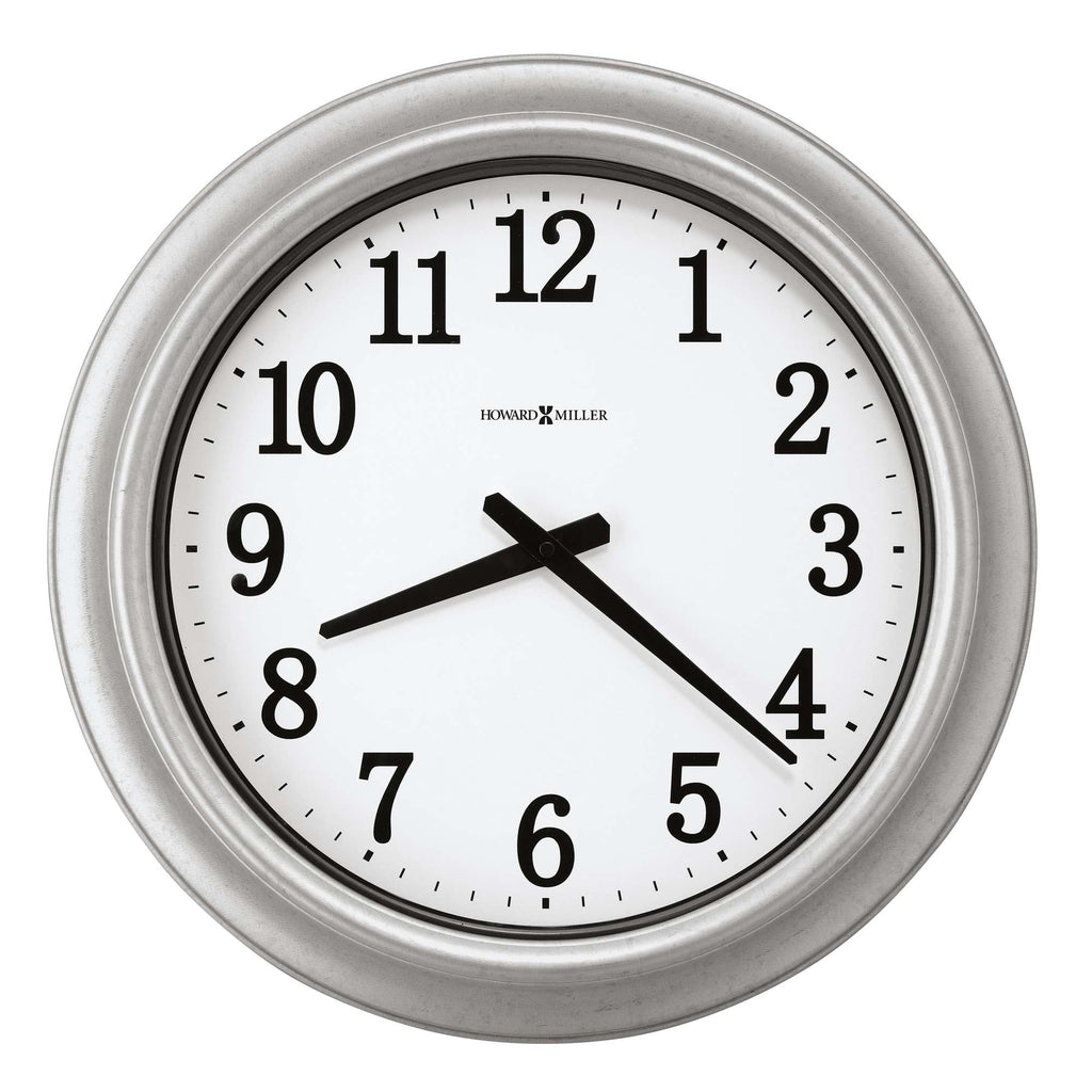 Wall clock with black numbers and hands on a white background.