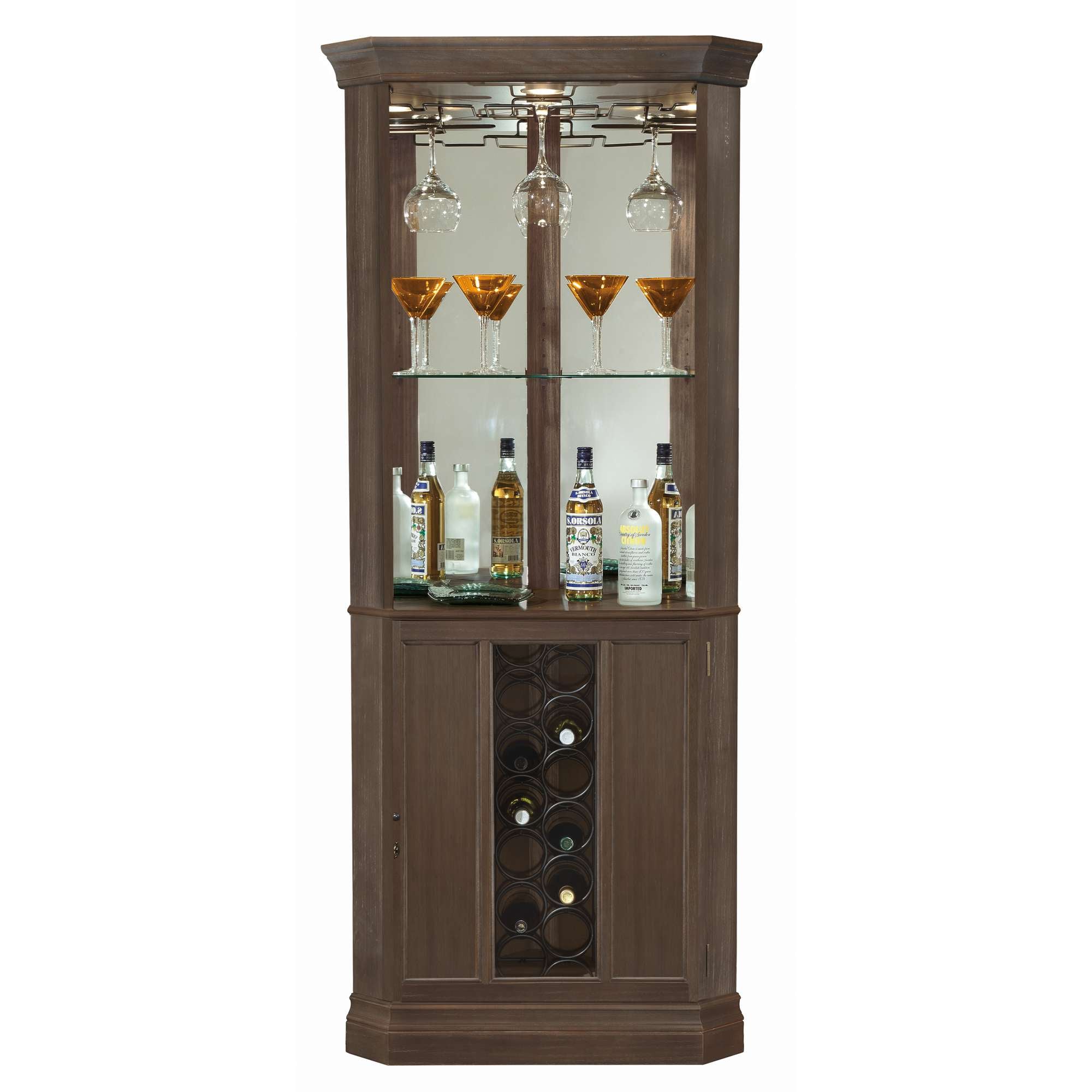 Wooden bar cabinet with glass shelves, displaying various bottles and wine glasses.