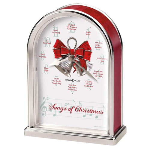 A decorative musical box featuring a bow and bells, labeled 'Songs of Christmas'.