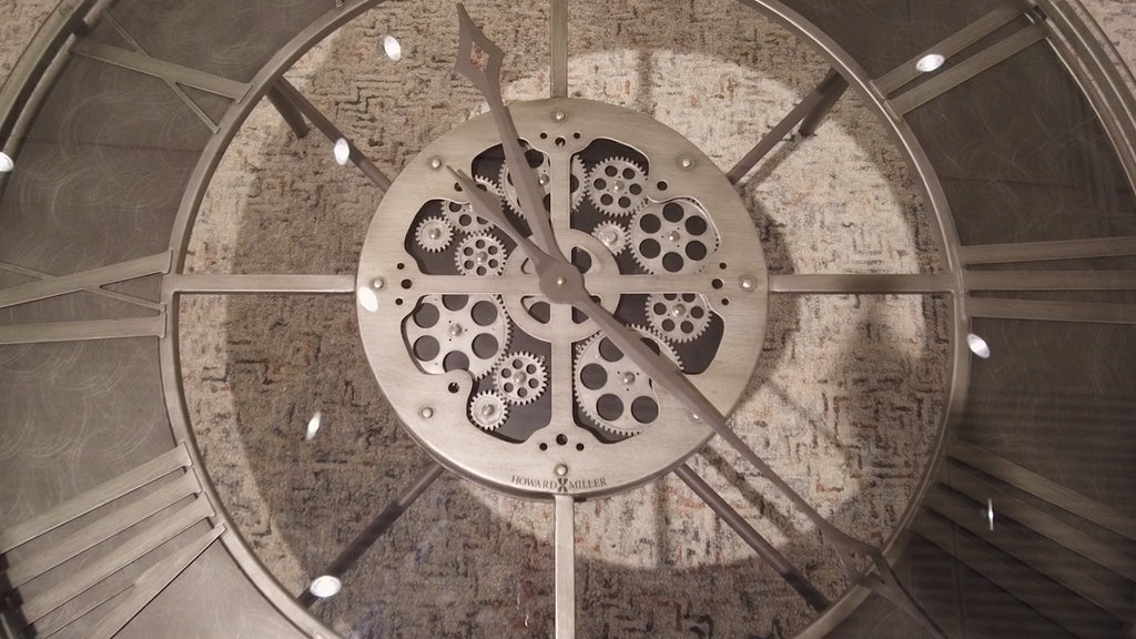 Close-up of a decorative clock mechanism with gears.
