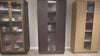 Three modern storage cabinets in various wood finishes