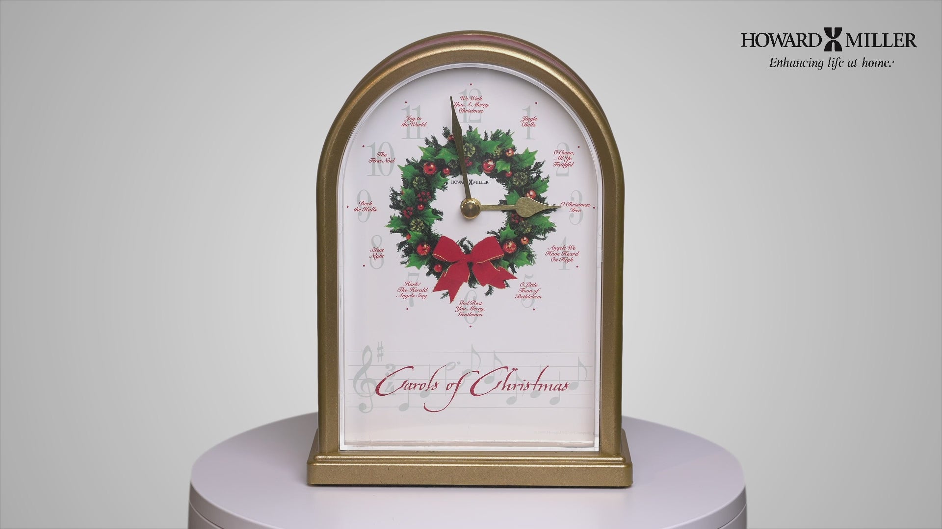 A decorative clock featuring a Christmas wreath and the text 'Countdown to Christmas' in a festive design.