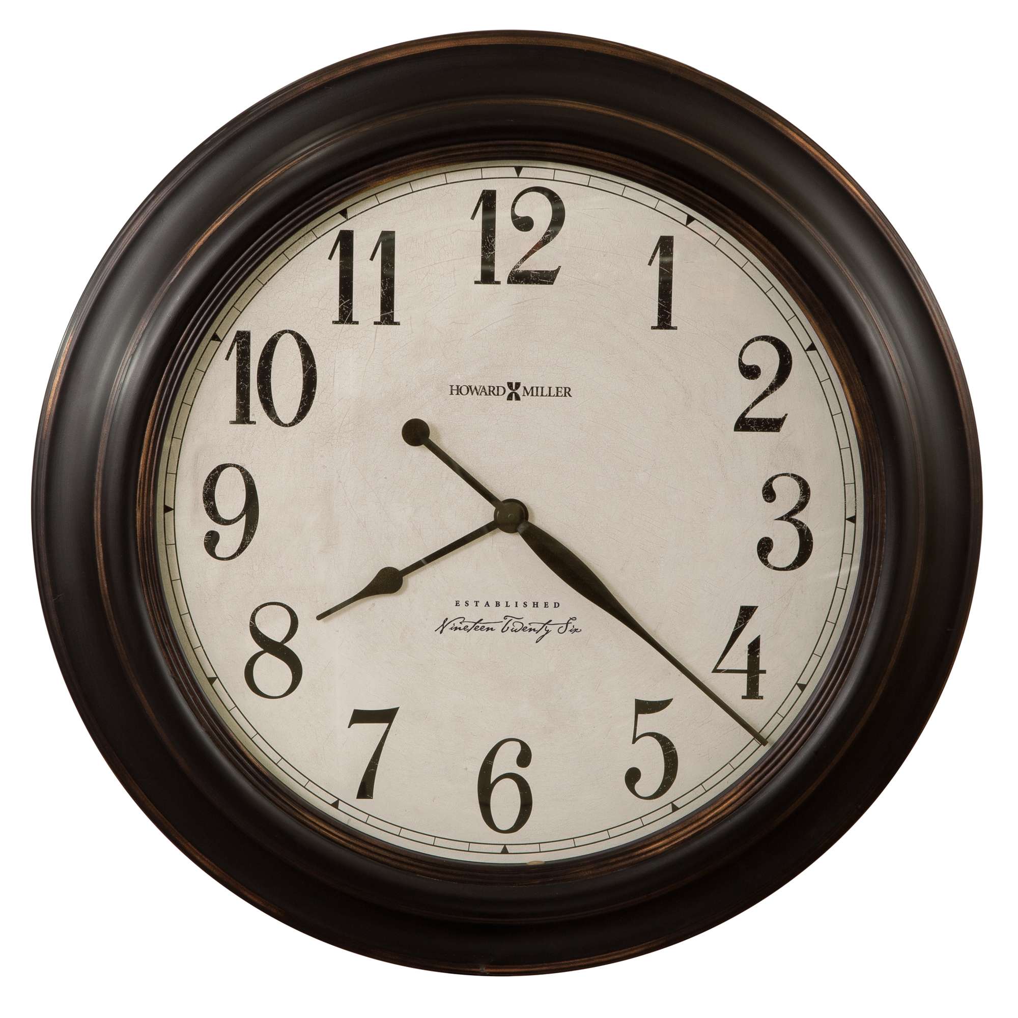 Classic round wall clock with black frame and vintage-style numbers.
