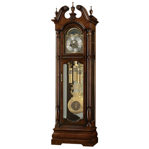 Antique wooden grandfather clock with intricate details and glass panels