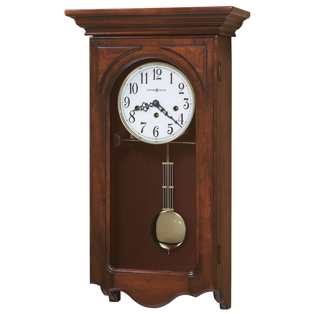Antique wall clock with a pendulum and wooden casing