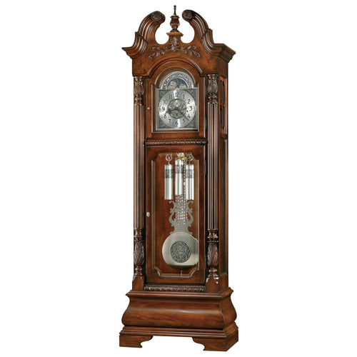 A traditional wooden grandfather clock with ornate design and glass panels.